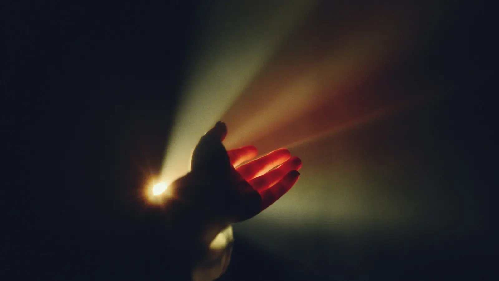 Hand bending a beam of light – internet wizards at work